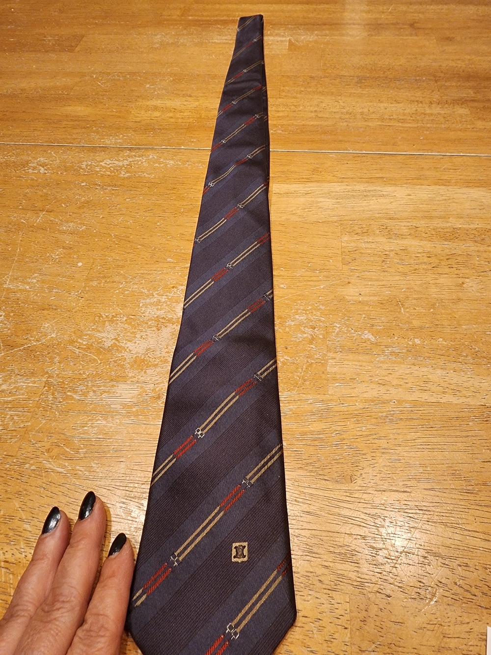 vintage Celine Paris navy blue silk tie featuring a diagonal striped pattern